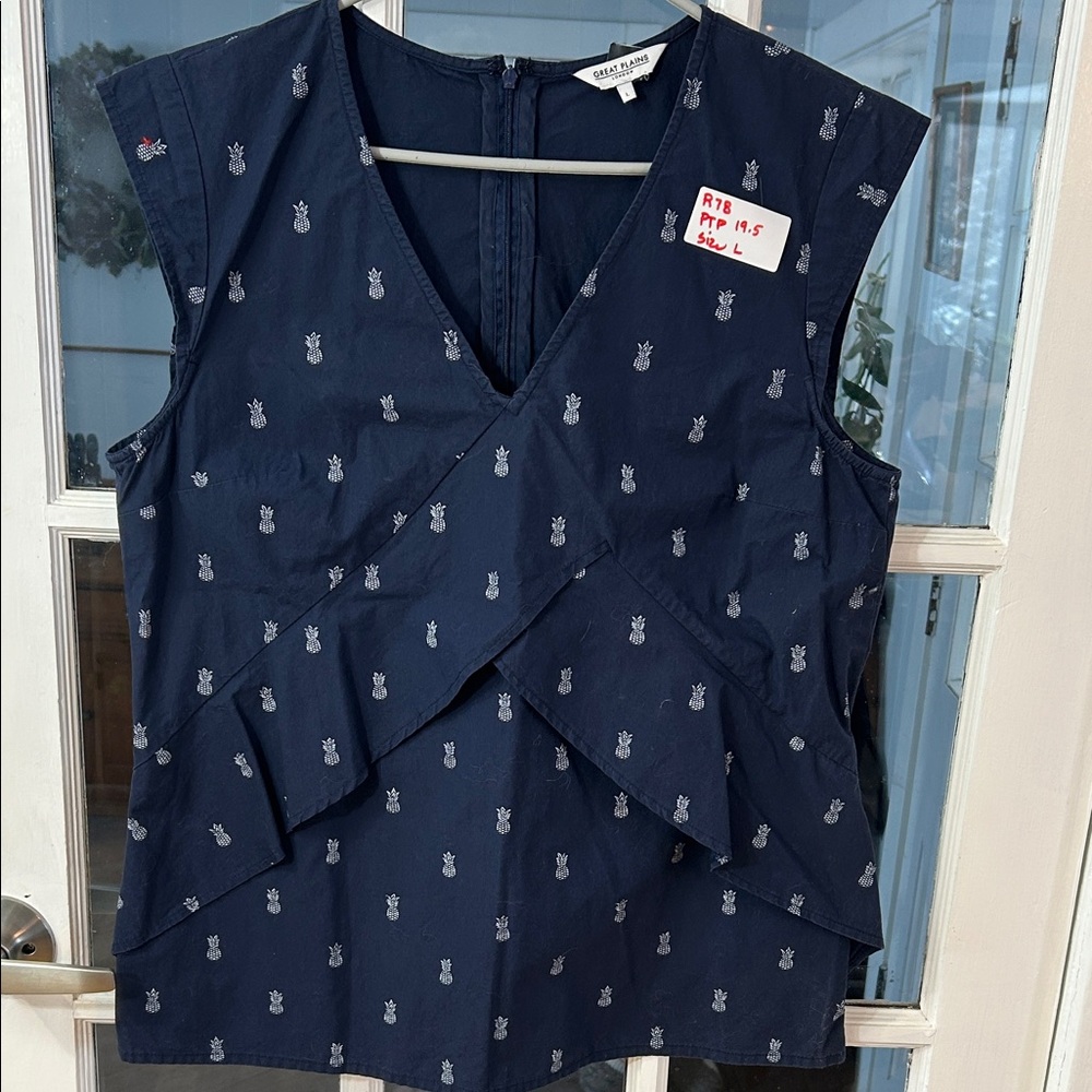 R78.     Great Plains Navy Blue V-Neck Blouse with Pattern